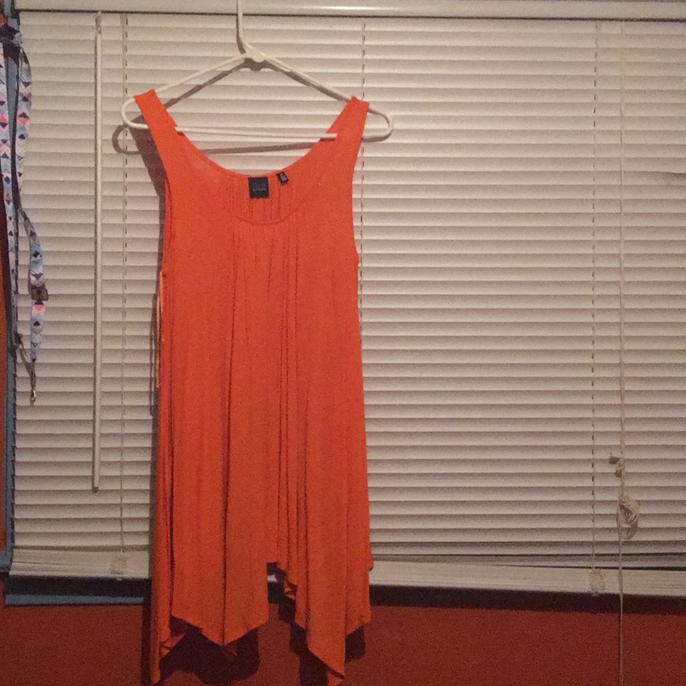 A flowy orange tank top